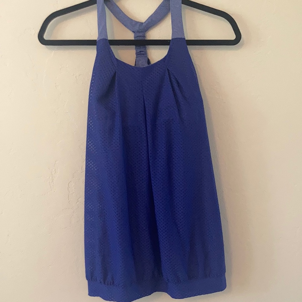 Size 6. Purple tank top with built in bra and racer back.